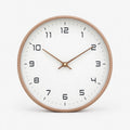 Nordik - Minimalist Wooden Wall Clock Checking The Time