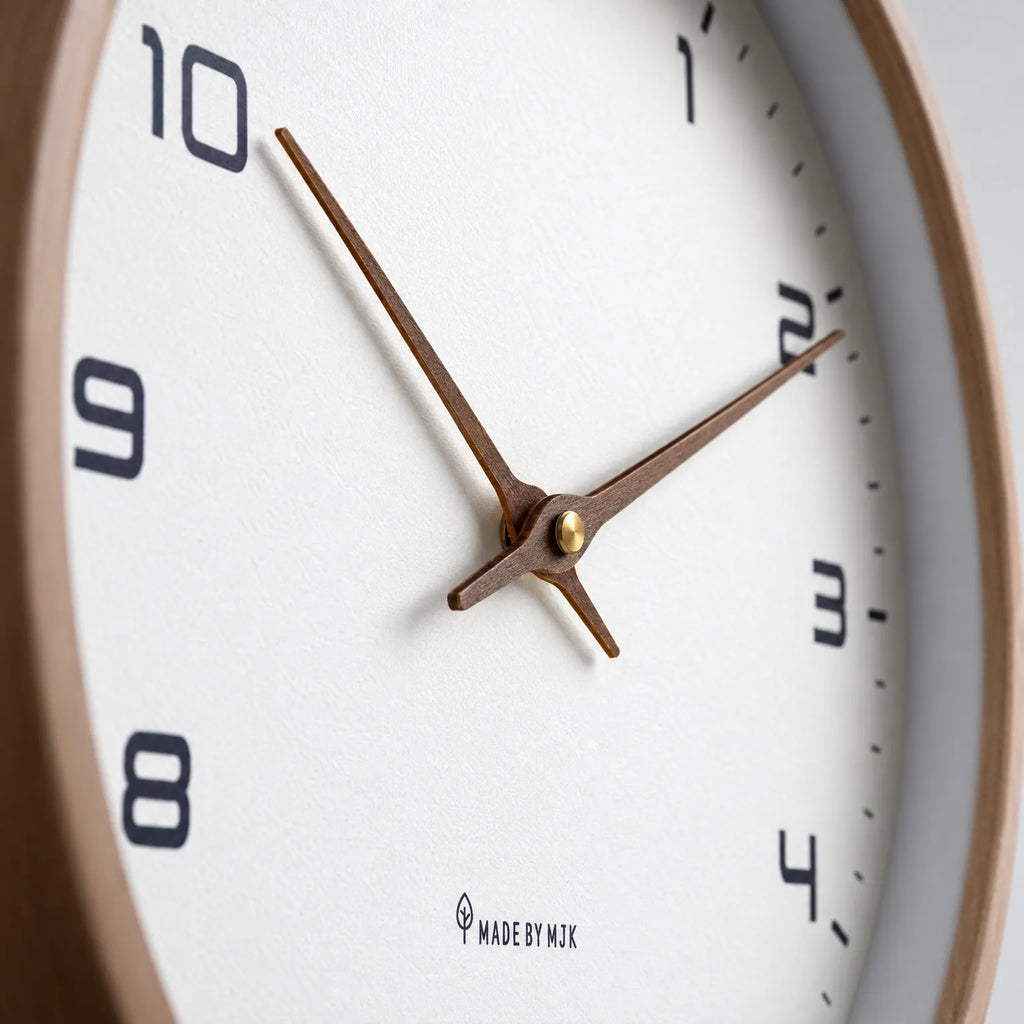 Nordik - Minimalist Wooden Wall Clock Checking The Time