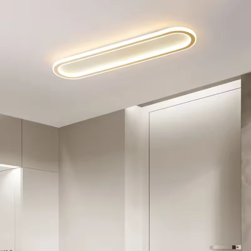 Elongated oval LED ceiling light with a flush-mounted modern design