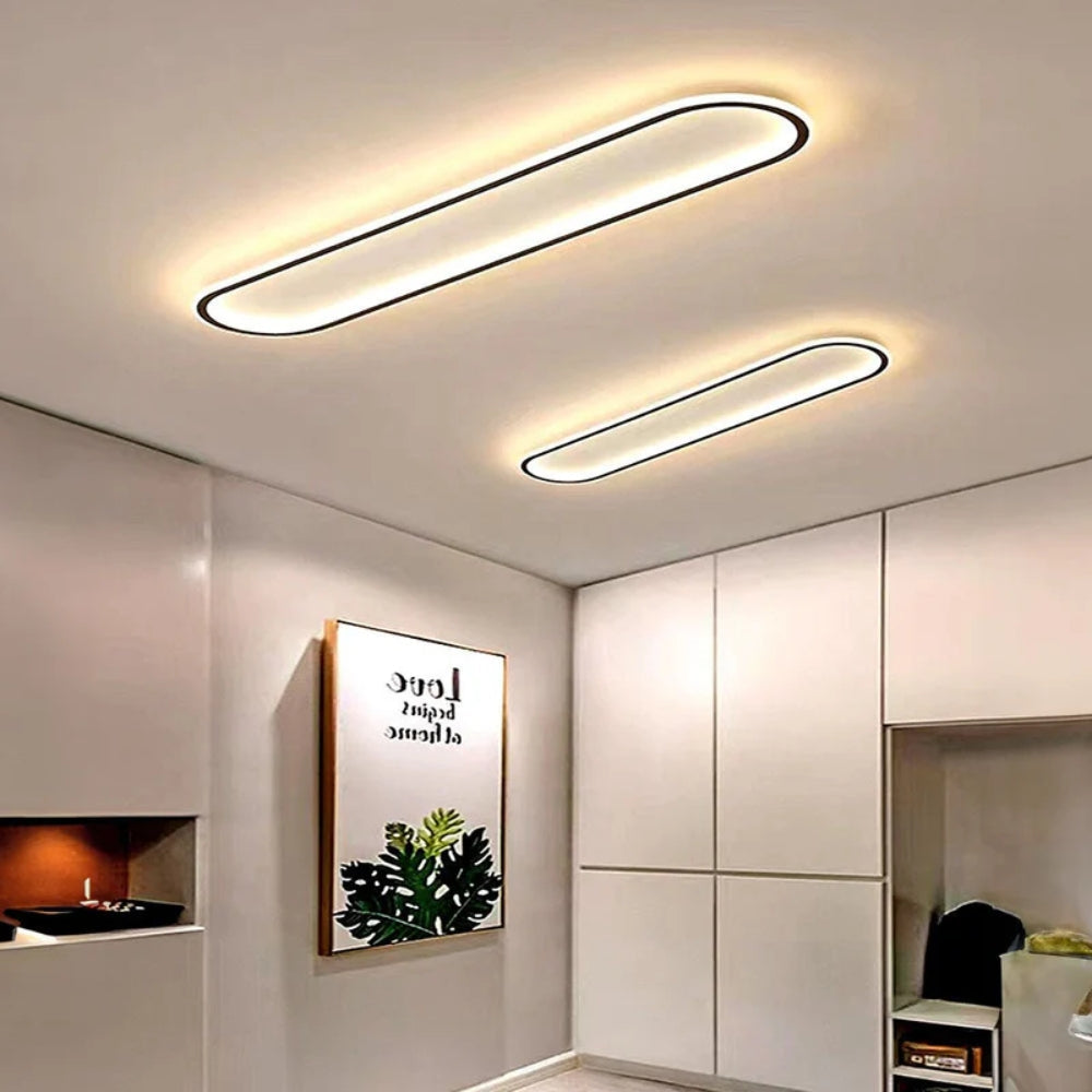 Elongated oval LED ceiling light with a flush-mounted modern design