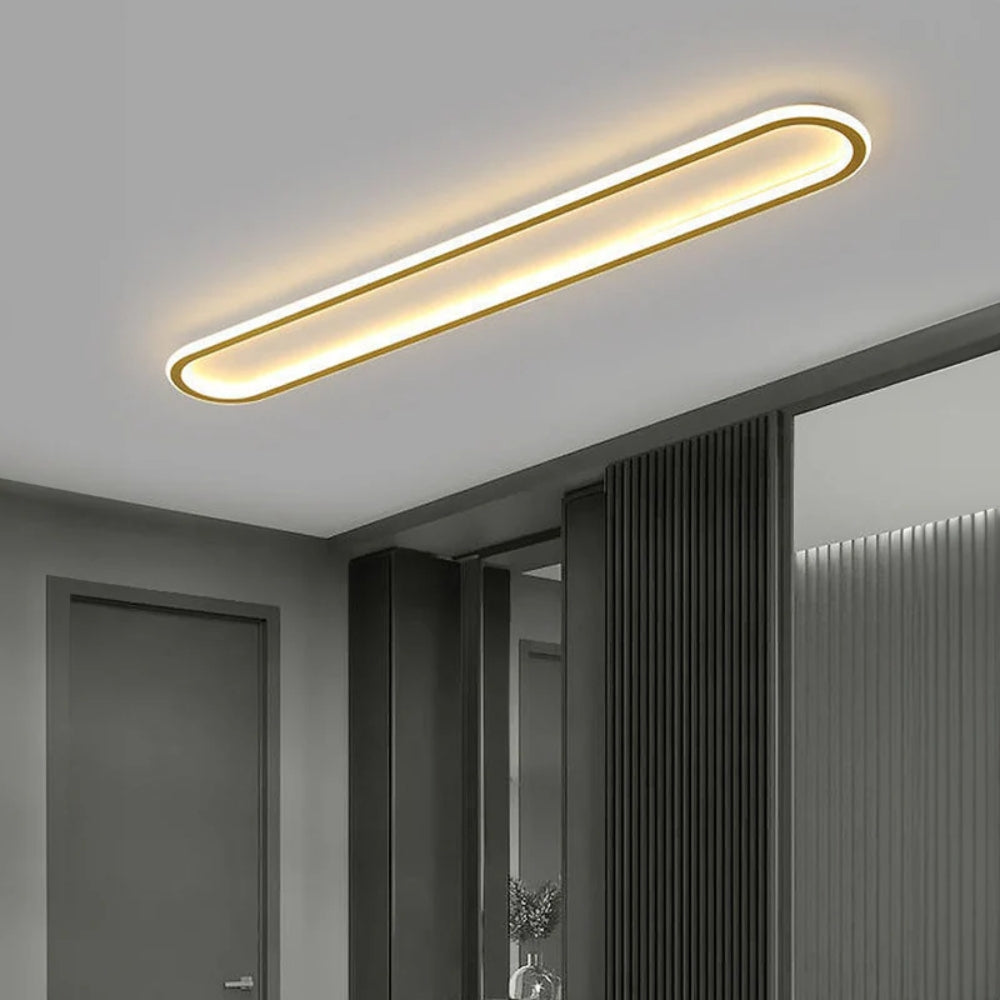 Elongated oval LED ceiling light with a flush-mounted modern design