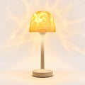 Noxida - Cordless Ambient Bedside Lamp Illuminating A Bedside Table