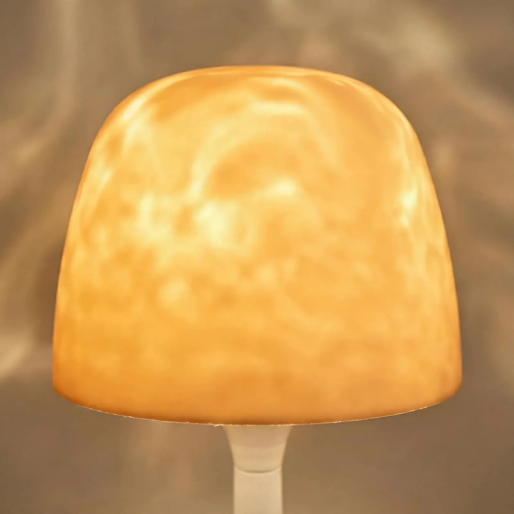 Noxida - Cordless Ambient Bedside Lamp Illuminating A Bedside Table