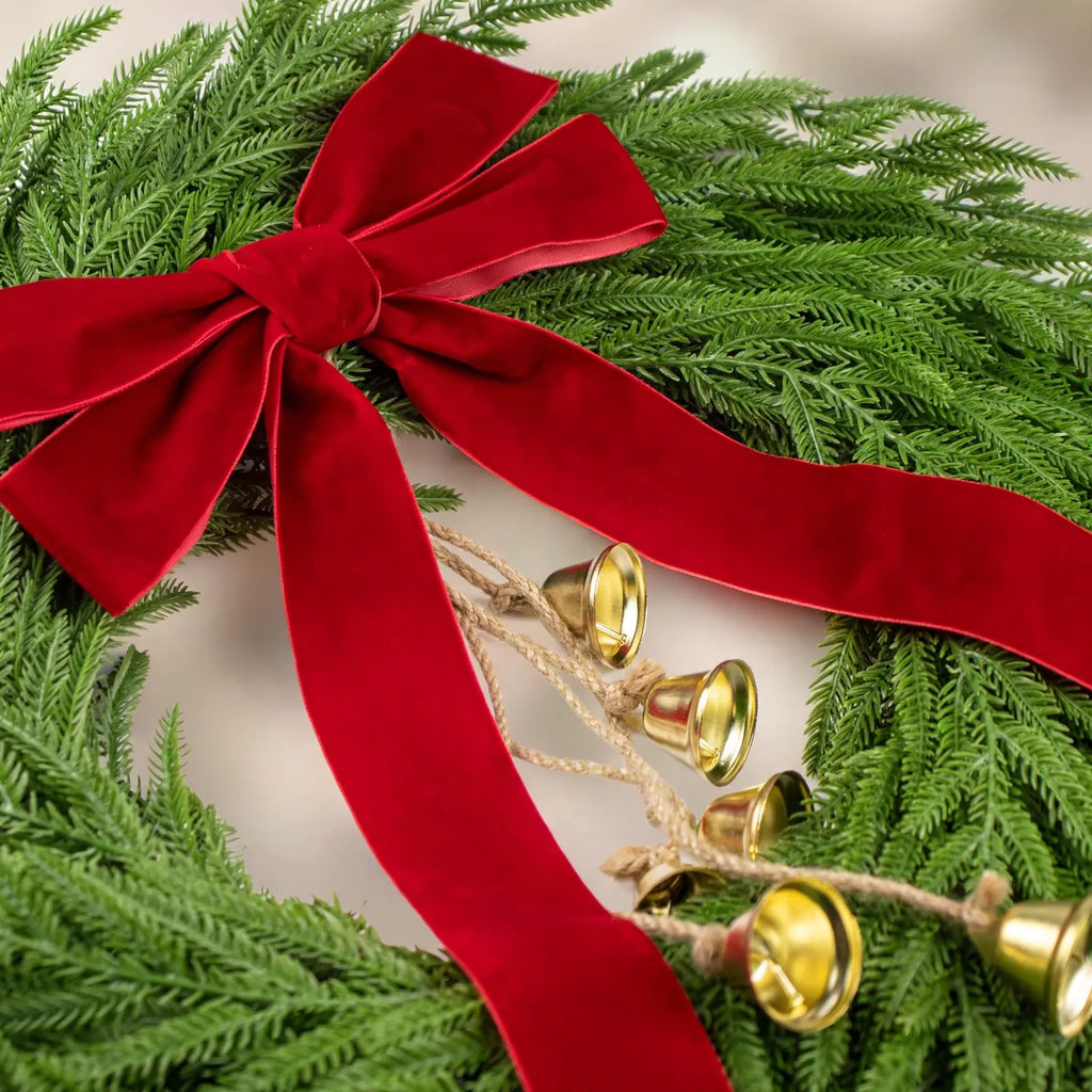 Artificial evergreen Christmas wreath with festive decorative accents