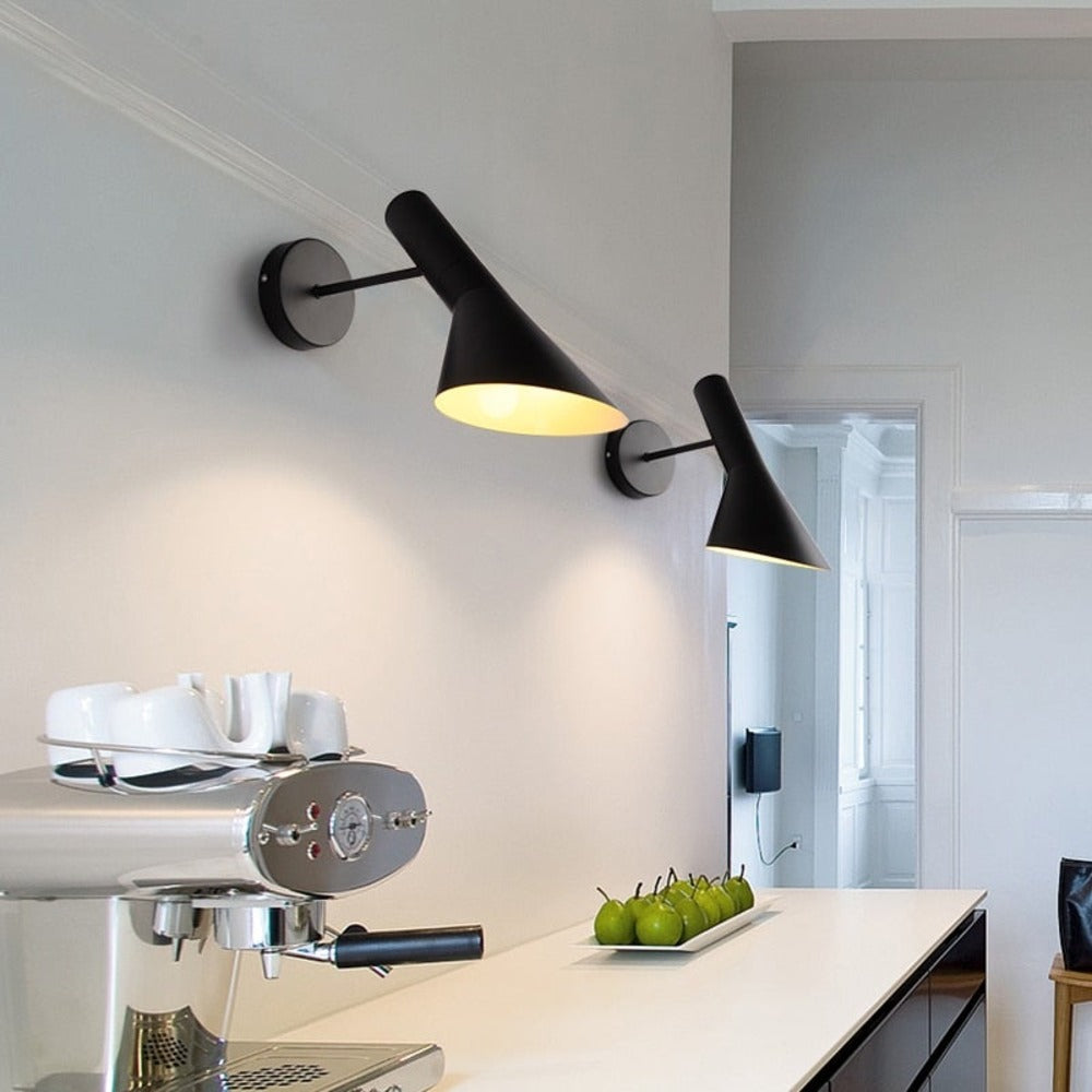 Adjustable LED wall light with a conical shade and round wall mount