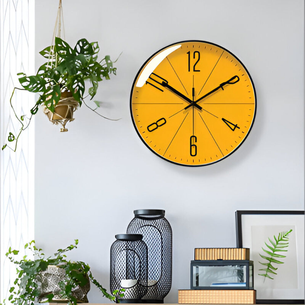 Round minimalist wall clock with graphic numerals and radial dial lines