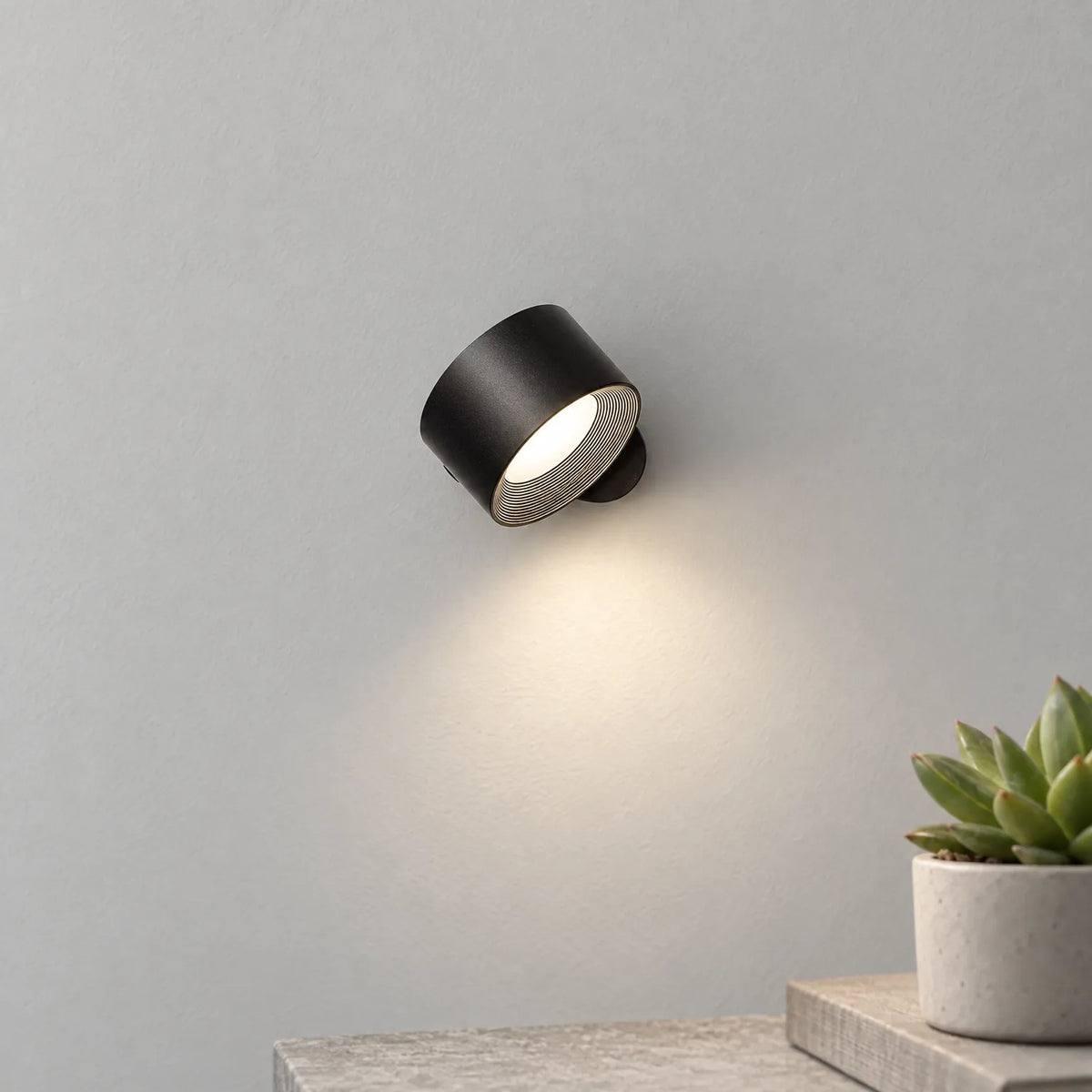 Orbit - Rechargeable Wall Light Reading In Bed