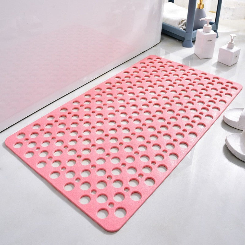 Perforated non-slip bath mat with repeated circular holes