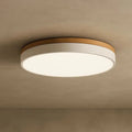 Circular flush-mount ceiling light with white diffuser and wood-effect rim