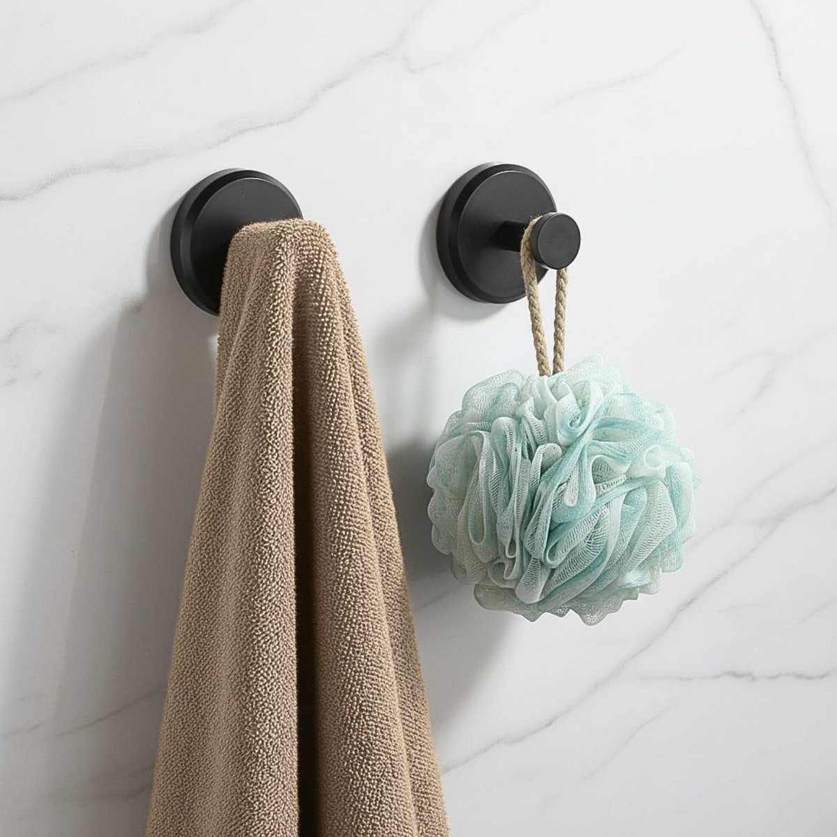 Four round self-adhesive wall hooks for bathroom and kitchen storage