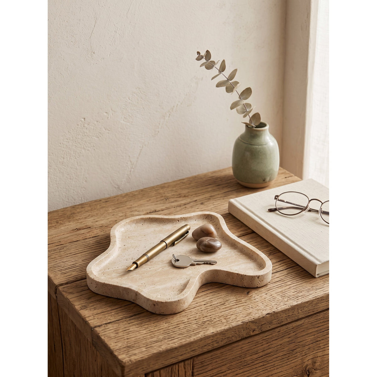 Beige organic-shaped stone decorative tray with raised edge
