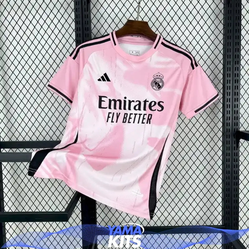 Pink Real Madrid football jersey with abstract pattern and black trim