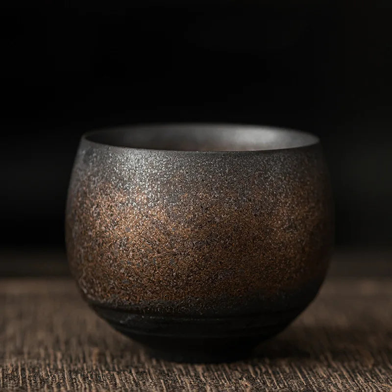 Handmade ceramic espresso cups with textured glazed finishes
