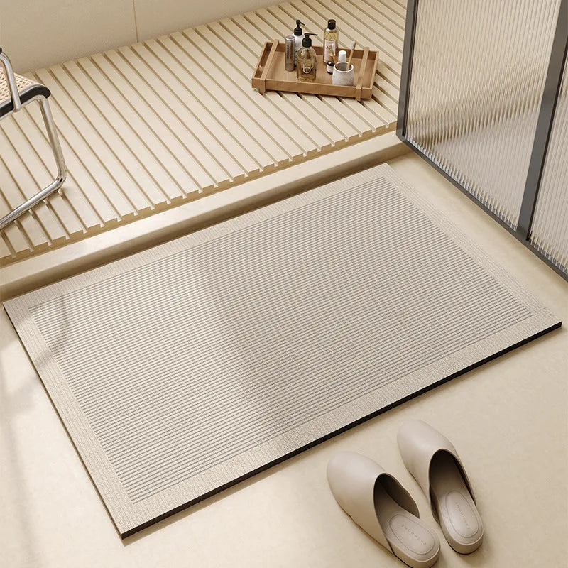 Rectangular neutral bath mat with textured surface and bordered edge