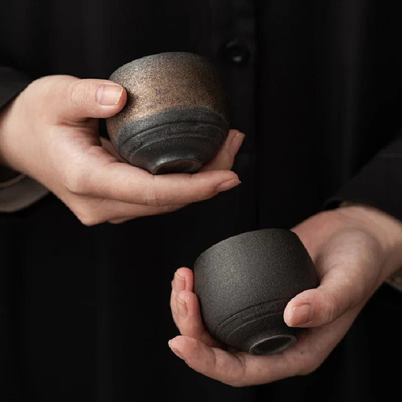 Handmade ceramic espresso cups with textured glazed finishes
