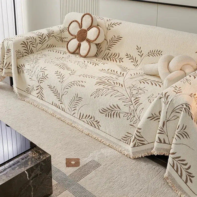 Chenille jacquard sofa cover with botanical leaf pattern and fringed edge
