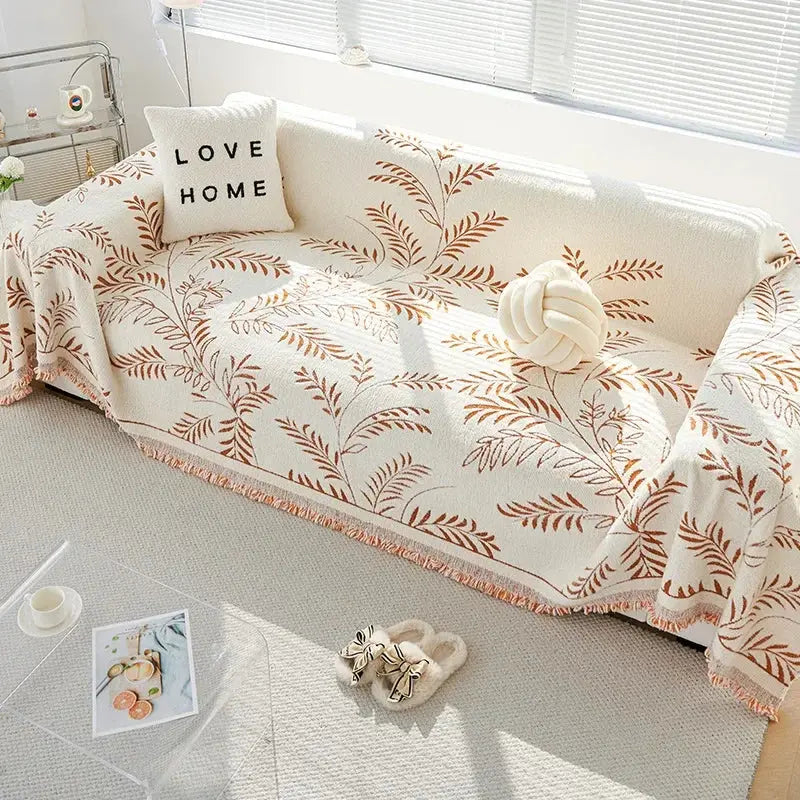 Chenille jacquard sofa cover with botanical leaf pattern and fringed edge