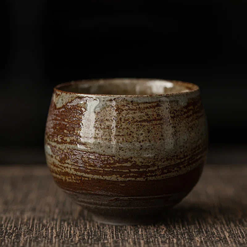 Handmade ceramic espresso cups with textured glazed finishes
