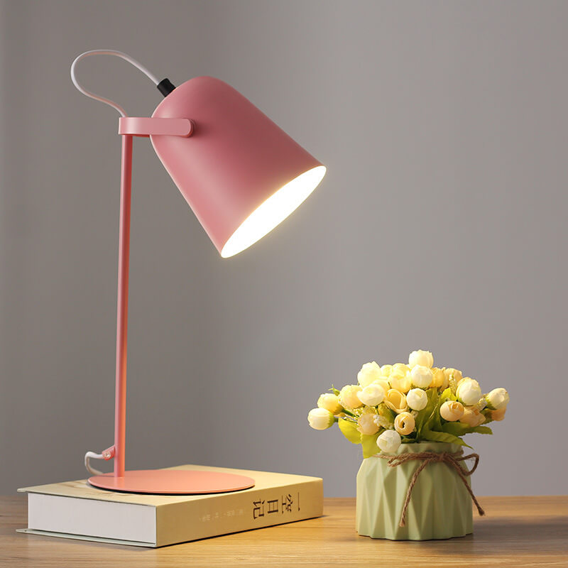 Nordic-style table lamp with angled metal shade, slim stand and round base