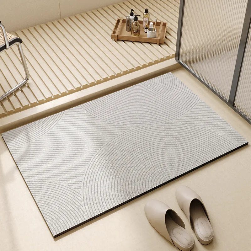 Rectangular neutral bath mat with textured surface and bordered edge