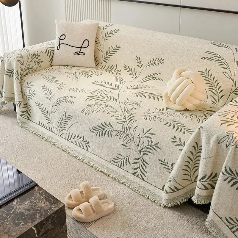 Chenille jacquard sofa cover with botanical leaf pattern and fringed edge