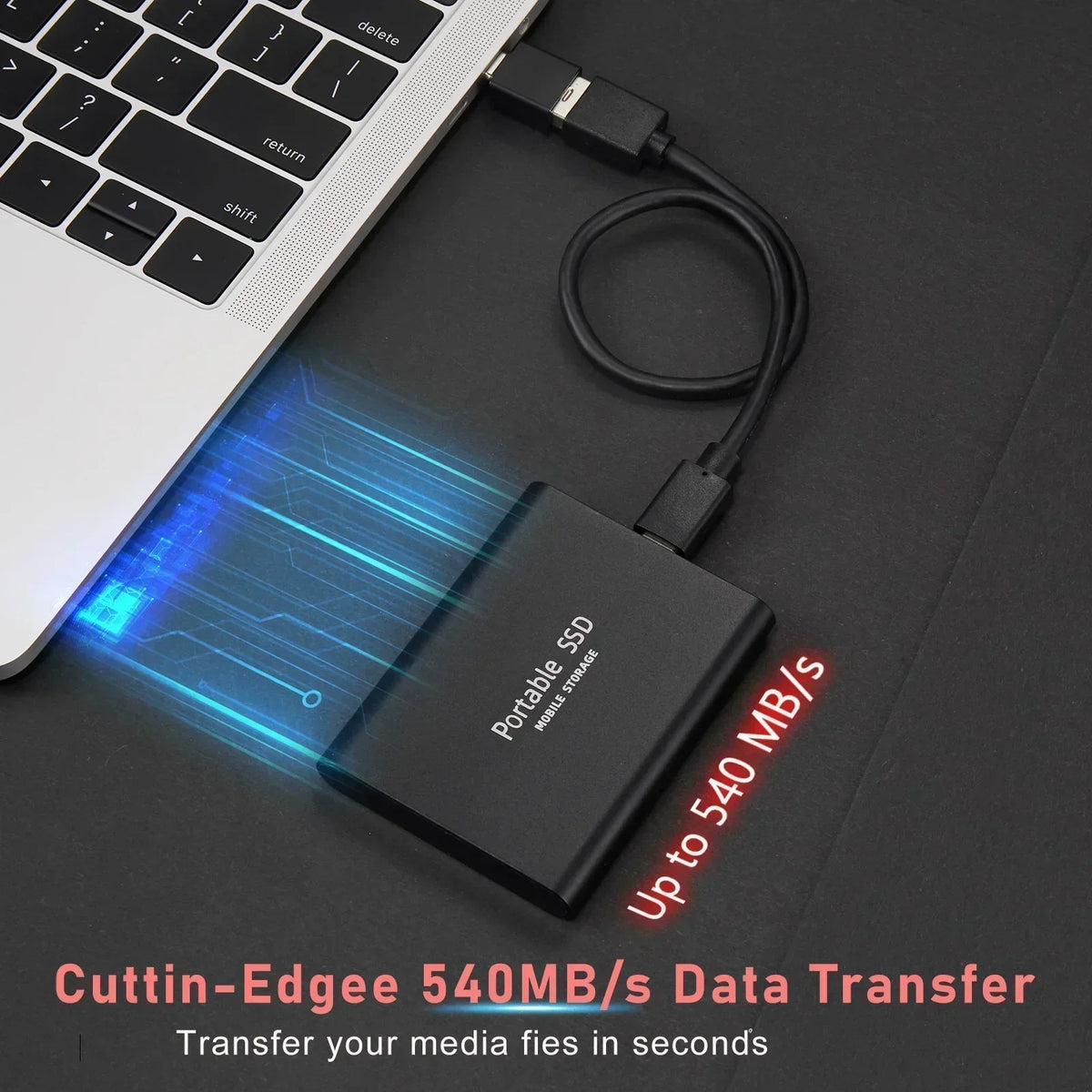 Portable external SSD connected to a laptop with a cable