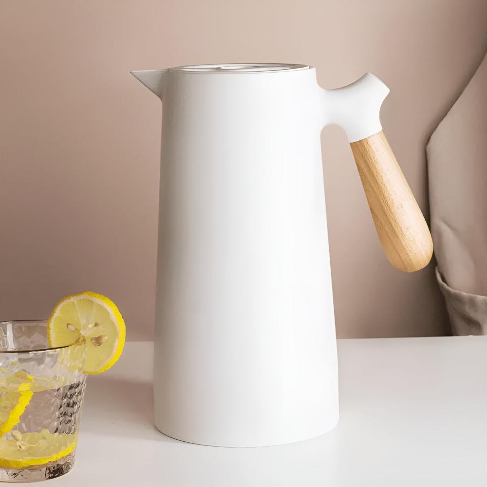 Insulated stainless steel beverage carafe with wooden handle and fitted lid