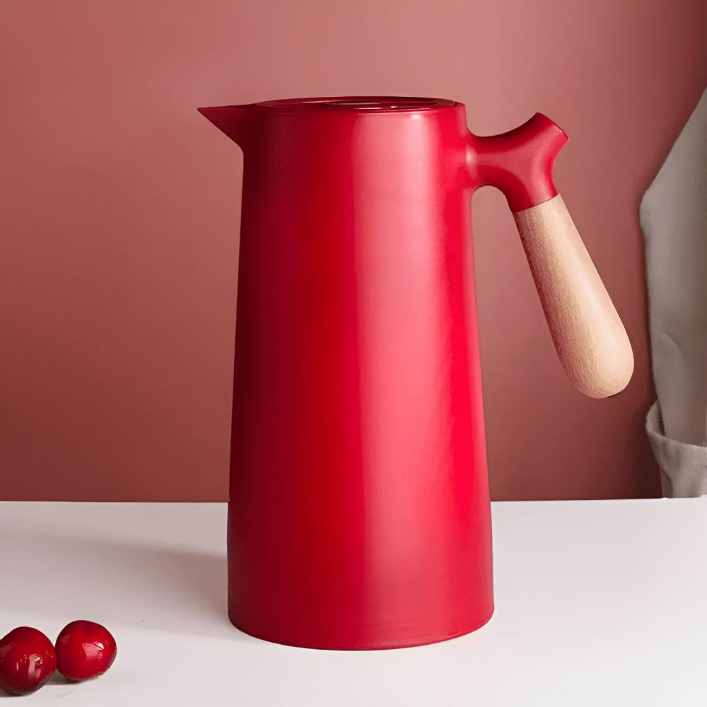 Insulated stainless steel beverage carafe with wooden handle and fitted lid