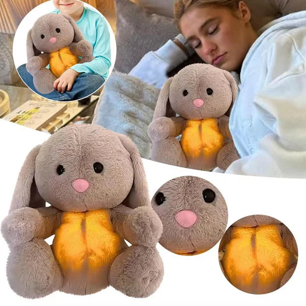 Grey rabbit stuffed animal with floppy ears and illuminated yellow belly