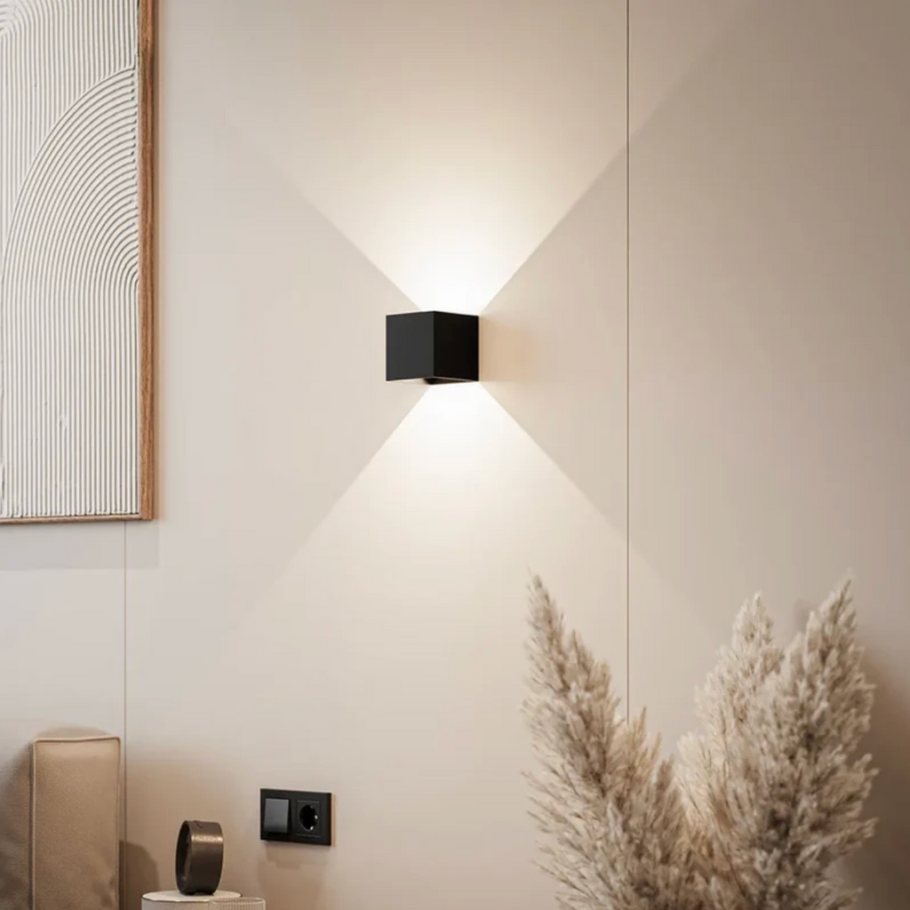 Geometric LED wall light projecting light upwards and downwards