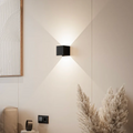 Geometric LED wall light projecting light upwards and downwards