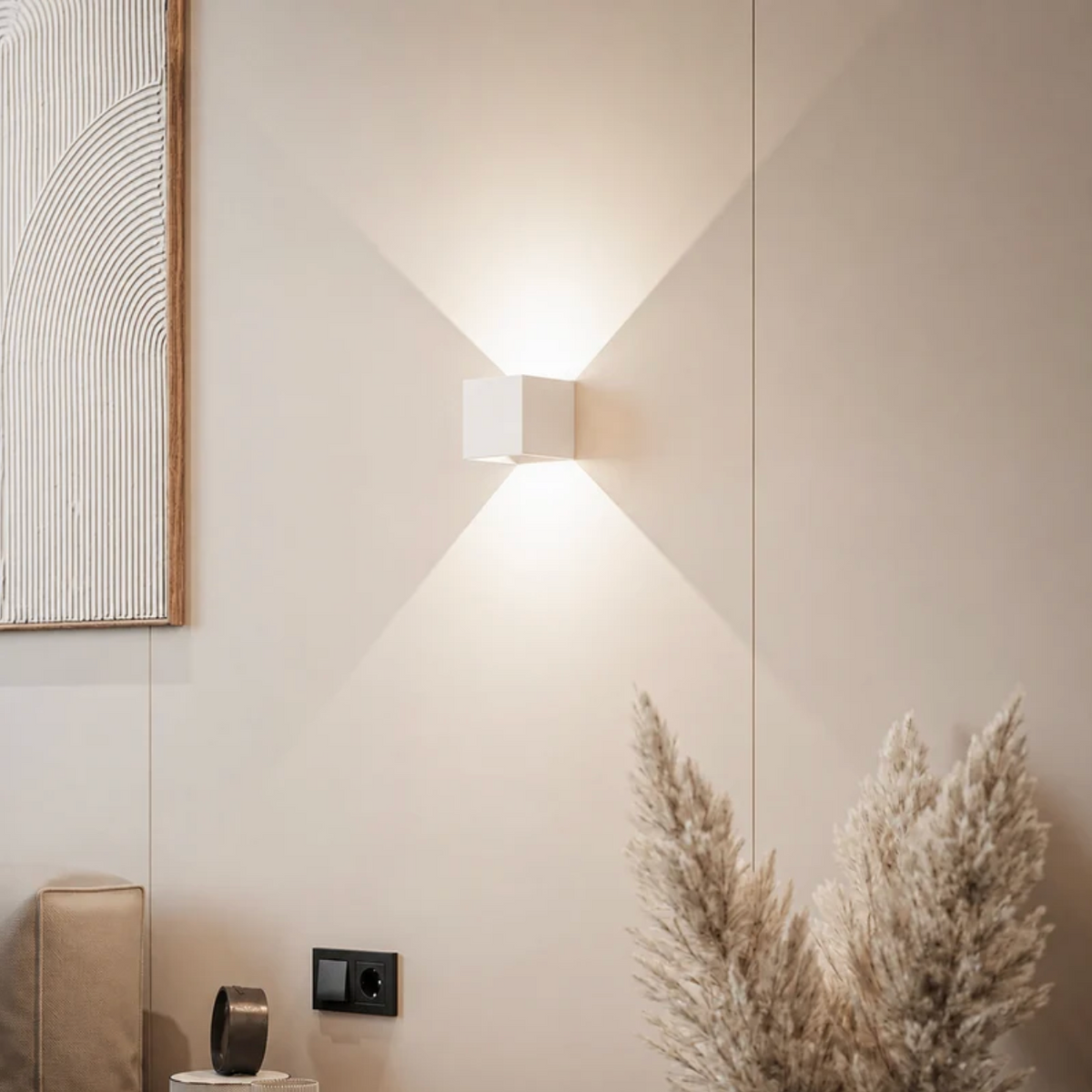 Geometric LED wall light projecting light upwards and downwards