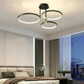 Geometric LED ceiling light with four circular rings