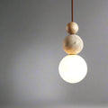 Pendant ceiling light with three stacked spherical details and a hanging cord