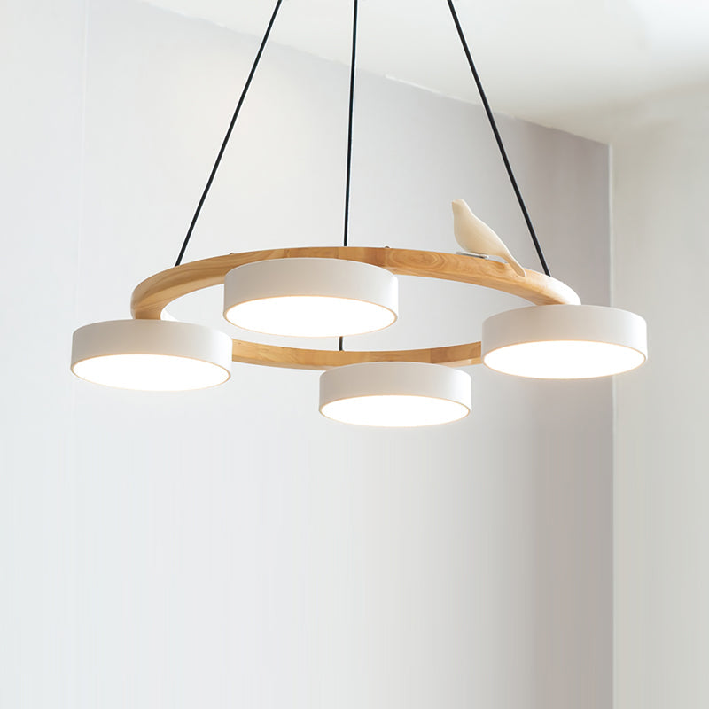 Round chandelier with four pendant shades, a wood-effect ring and bird ornament