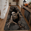 Black runner carpet with a skeleton and skull on a cracked ground design