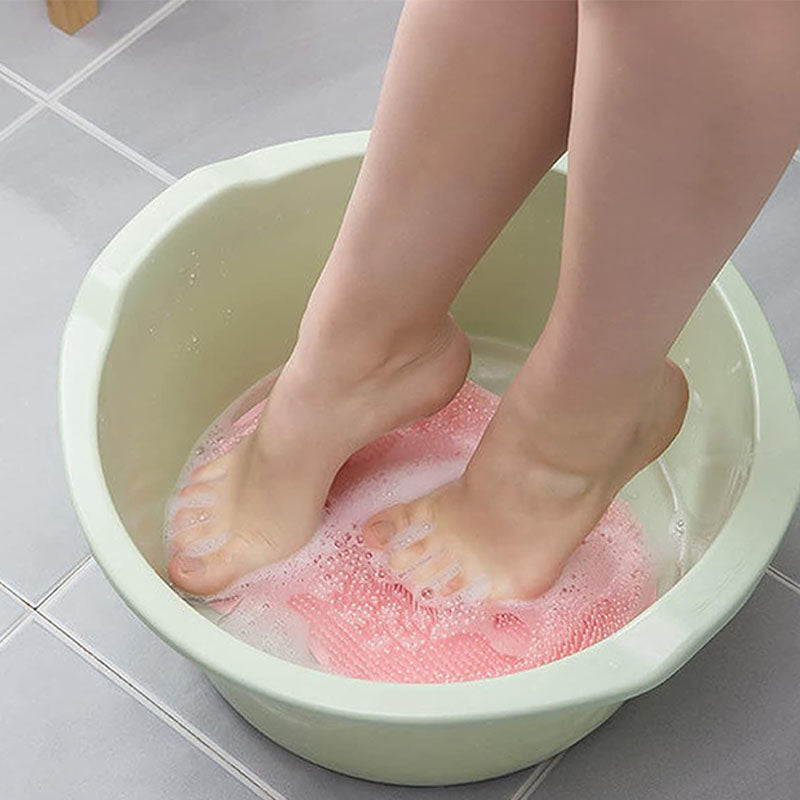 Textured handheld shower scrubber with dense bristles