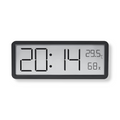 Digital wall clock displaying time, temperature and humidity