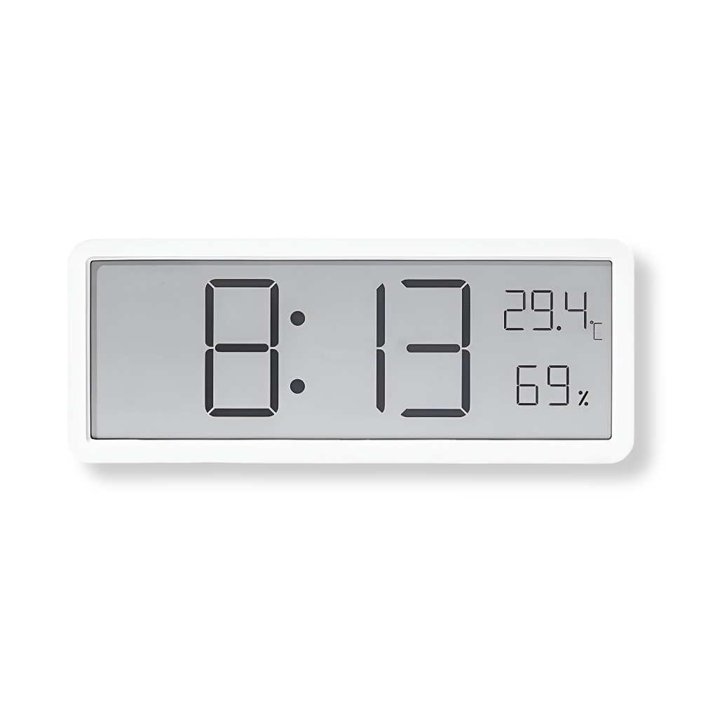 Digital wall clock displaying time, temperature and humidity