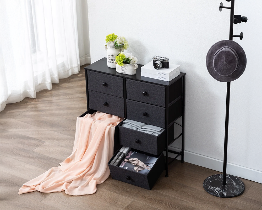 Black tall chest of drawers with eight dark fabric-effect drawer fronts