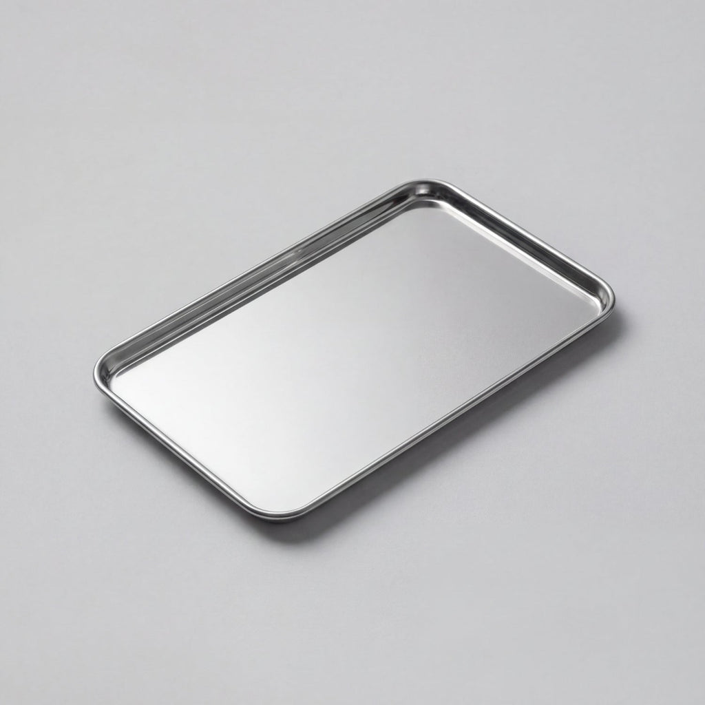 Reflective silver stainless steel serving tray with raised edge