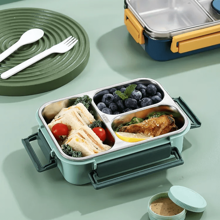 Compartment food storage container with stainless steel interior and round lidded insert