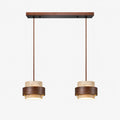Traverta - Stone Cylinder Pendant Light Illuminating Living Spaces