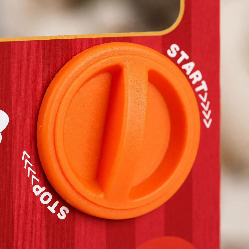 Red children's Christmas advent calendar with orange dial, colourful eggs and animal figures