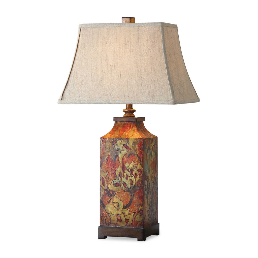 Floral table lamp with beige tapered shade and colourful patterned base