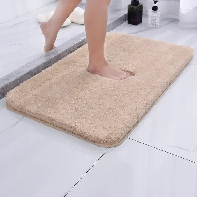Plush pile rectangular bathroom mat with rounded corners
