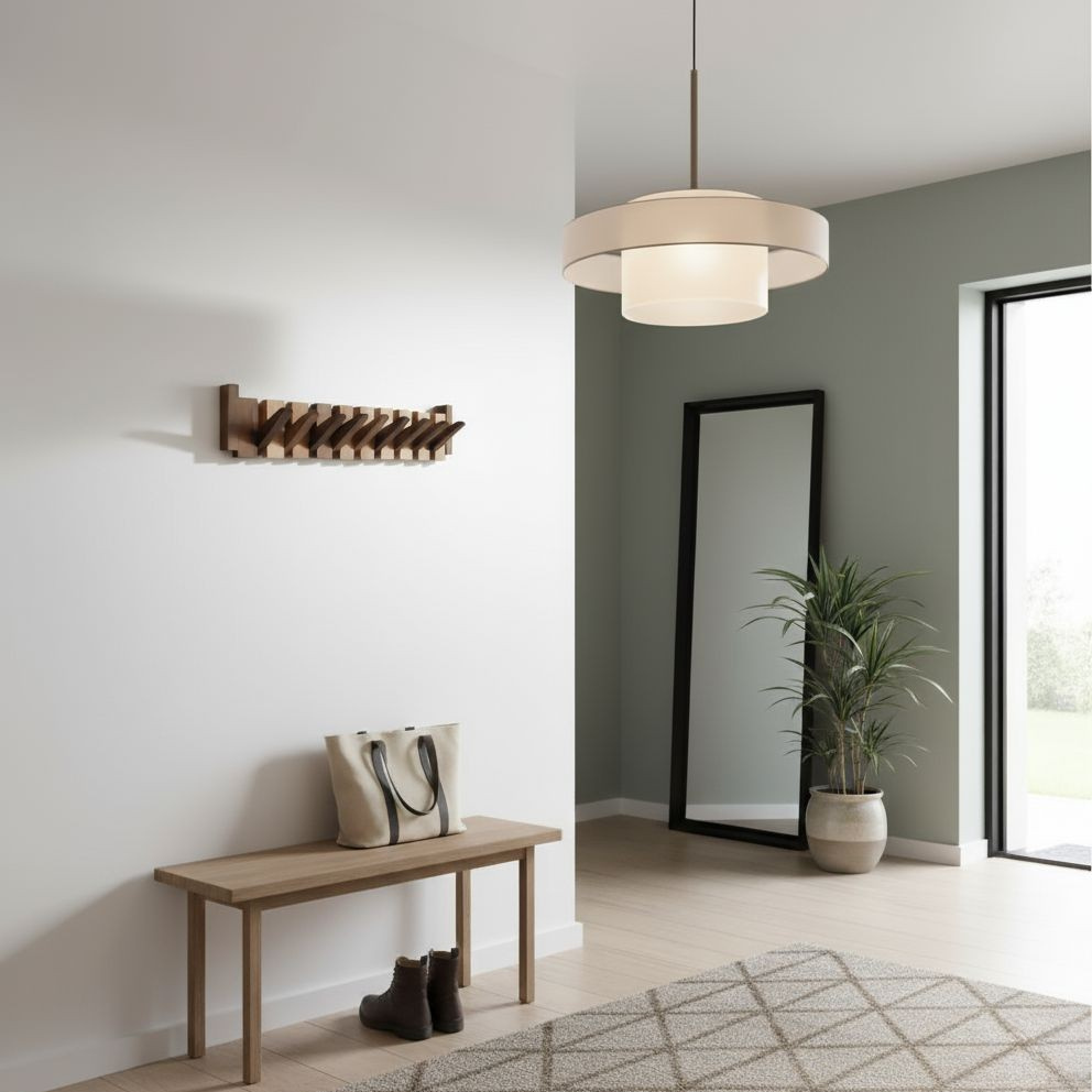 Wooden wall-mounted coat rack with multiple angled hooks