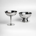 Silver stainless steel ice cream cup with a rounded bowl and pedestal base