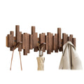 Wall-mounted slatted coat rack with folding hooks