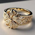 Ornate vintage floral ring with gold-tone and silver-tone detailing